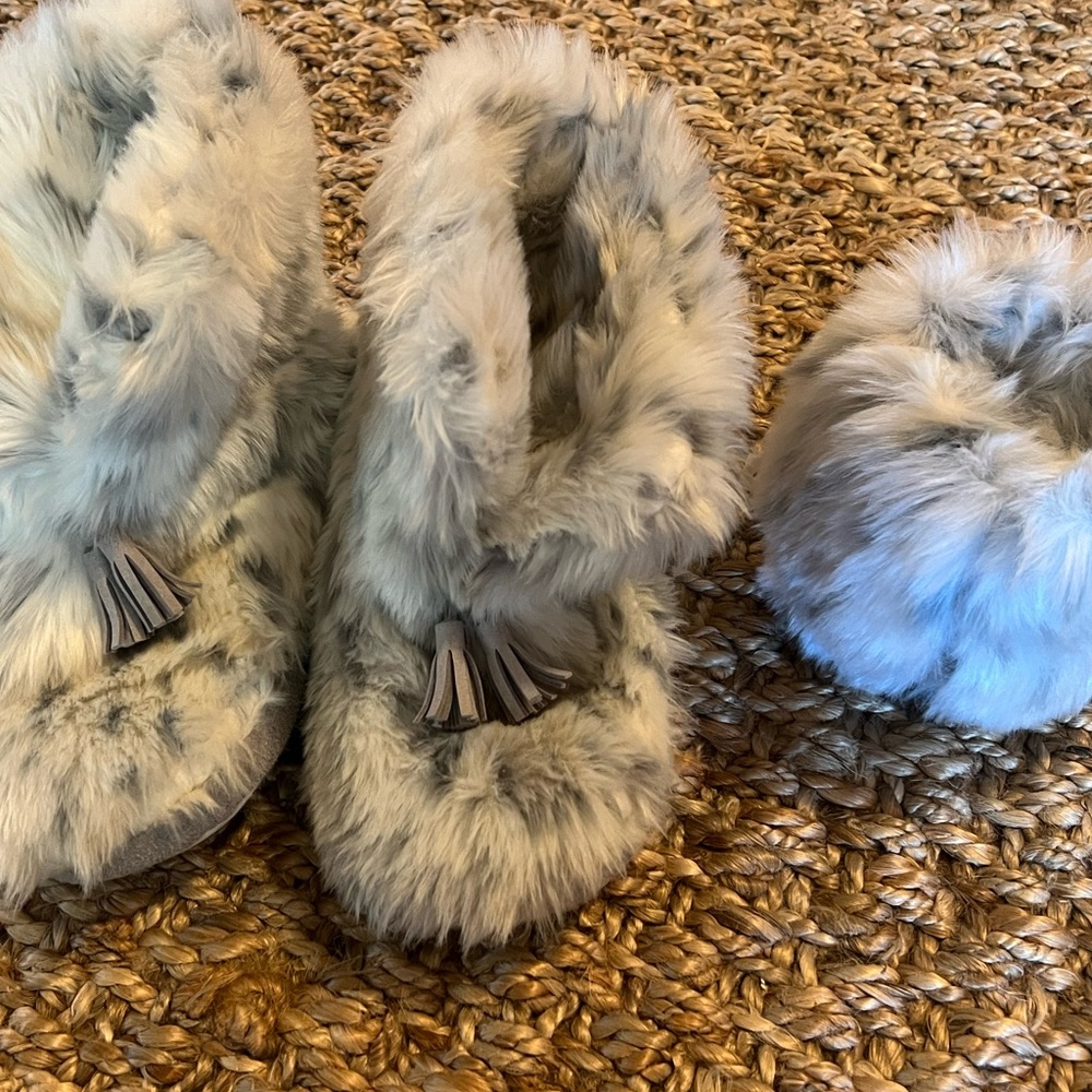 Pottery barn slippers and iPhone stand